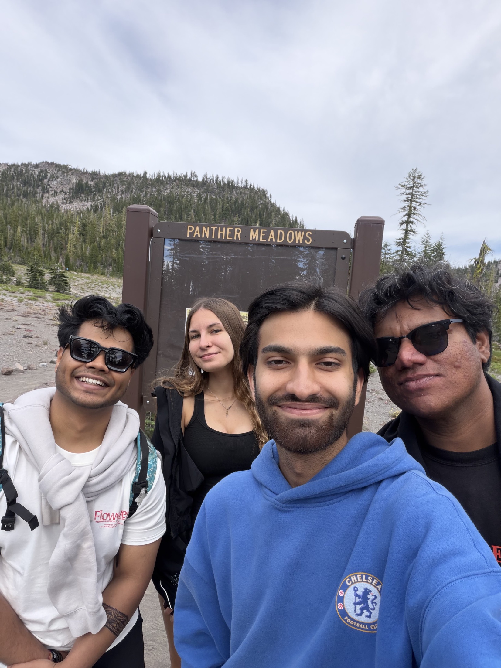 Four friends in a selfie outdoors